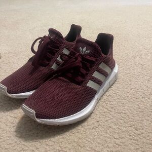 Maroon Adidas sneakers
